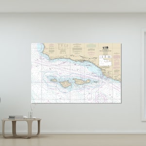 May include: A nautical chart of the Channel Islands, California, with detailed bathymetry and navigational information. The chart is printed on a cream-colored background with blue and pink lines.