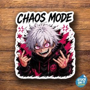 May include: A die-cut sticker featuring an anime-style character with spiky white hair and glowing pink eyes, wearing a black hoodie with a pink smiley face logo. The text CHAOS MODE is printed above in black, set against a pink and black splatter background.