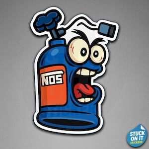 May include: A blue cartoon sticker of a NOS tank with a surprised face, open mouth, and red tongue. The tank has an orange label with the letters "NOS" in white. The sticker has a white border and the words "STUCK ON IT STICKERS" on a blue sticker.