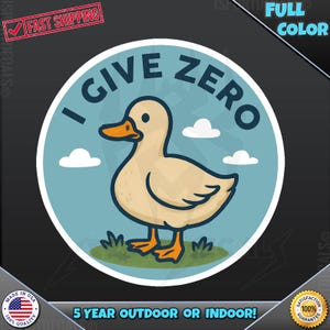 May include: A round sticker with a cartoon duck illustration. The duck is beige with an orange beak and feet, standing on green grass. The text "I GIVE ZERO" is in a blue circle, with white clouds. The sticker is full color.