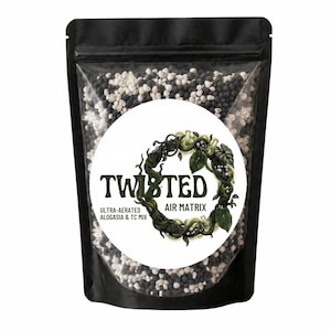 May include: A black stand-up pouch with a clear front window filled with a mixture of small black and white porous granules. A circular white label features the text TWISTED AIR MATRIX ULTRA-AERATED ALOCASIA & TC MIX with a vine graphic.
