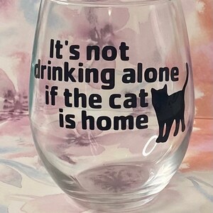 It’s not drinking alone if the cat is home