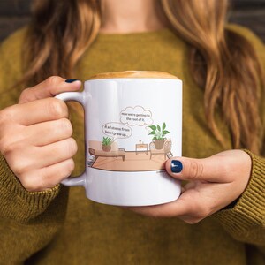 Plant therapy mug is a perfect therapist gift or therapy office decor! Two plants sit on therapy couches with the patient saying, it all stems from how I grew up and the mental health therapist thinking, now we're getting to the root of it!