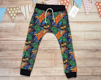 Skating Dinosaur Joggers | Street Dino Harem Joggers | Kids Harem Pants | T-Rex Pants | Soft Baby Trousers | Skateboarding Dinosaur Trousers