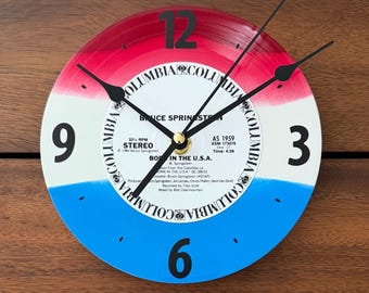 Platenklok: 7" rood-wit en blauw vinyl Bruce Springsteen-platenmuziek kunstdecoratie