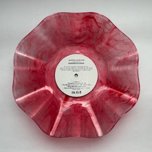 May include: A bowl crafted from a red and white marbled vinyl record featuring a central white label with the text good kid, m.A.A.d city by KENDRICK LAMAR, listing tracks including Compton, The Recipe, Black Boy Fly, and Now or Never.