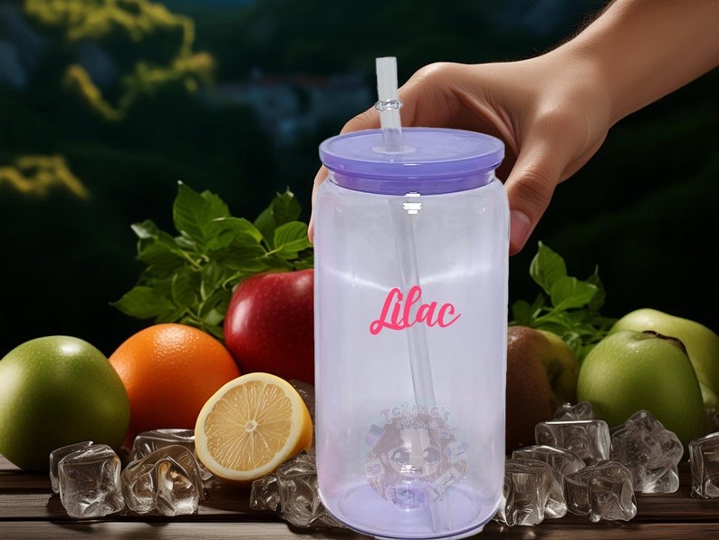 May include: A clear plastic reusable water bottle with a purple lid and a straw. The bottle has the word "Lilac" written on it in pink lettering.