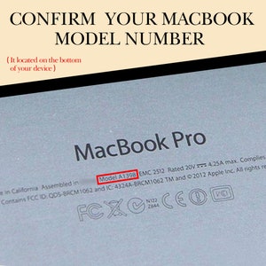 May include: Close-up of a silver MacBook Pro laptop with the model number "A1398" printed on the bottom. The laptop has a silver aluminum body and a black keyboard. The text "MacBook Pro" is printed in black on the laptop.