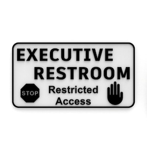 May include: Black and white sign with the text "Executive Restroom Restricted Access". The sign has a stop sign symbol and a hand with a palm facing out.