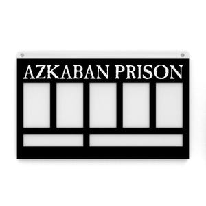 May include: Black and white sign with the text "Azkaban Prison" at the top. The sign is divided into six rectangular sections.
