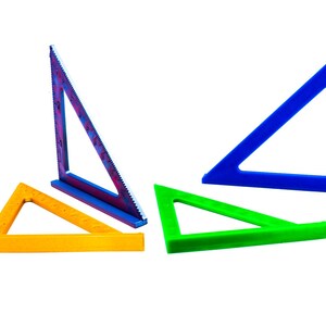 May include: A selection of colourful triangle rulers in blue, green, yellow, and a multi-coloured ruler with a ruler edge. These tools are used for measuring and drawing angles, commonly used in geometry and drafting.
