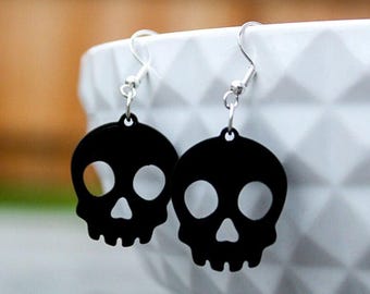 Alexander McQueen Orecchini con teschio argento | MODES