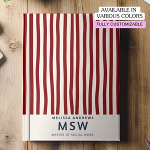 May include: A notebook with a red and white striped cover. The notebook has the text "MELISSA ANDREWS MSW MASTER OF SOCIAL WORK" on the bottom. The text "AVAILABLE IN VARIOUS COLORS" and "FULLY CUSTOMIZABLE" is also visible.