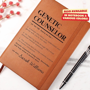 May include: A brown leather notebook with the words "Genetic Counselor" and a definition of the term. The notebook also says "Also Available in Notebook & Various Colors!" and is signed "Sarah Williams".
