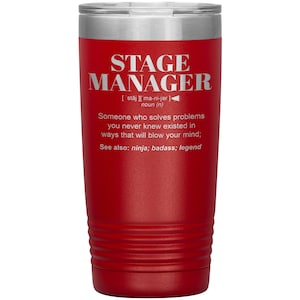 May include: Red stainless steel tumbler with a white inscription that reads "Stage Manager [stāj] [ma-ni-jər] noun (n) Someone who solves problems you never knew existed in ways that will blow your mind; See also: ninja; badass; legend"