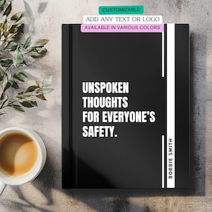 May include: A black notebook with the text "UNSPOKEN THOUGHTS FOR EVERYONE'S SAFETY" in white. The notebook has a white vertical stripe and the name "BOBBIE SMITH" on the side. The top of the notebook says "CUSTOMIZABLE" and "AVAILABLE IN VARIOUS COLORS".