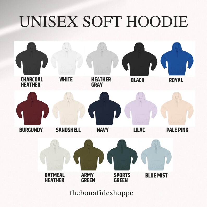 May include: A selection of unisex soft hoodies in various colors, including black, white, and blue mist. The image displays the hoodies with the color names below each one. The text "UNISEX SOFT HOODIE" is at the top.