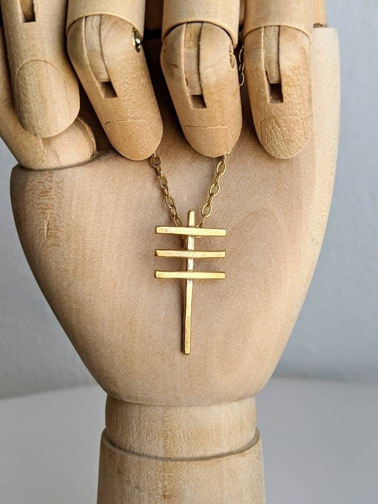 Frightened rabbit cross necklace deals