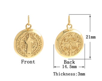 May include: Gold-colored pendant with a detailed design. The front features a figure, while the back displays a cross and symbols. The pendant is 21mm in height, 14.5mm wide, and 3mm thick. Includes a small loop for a chain.