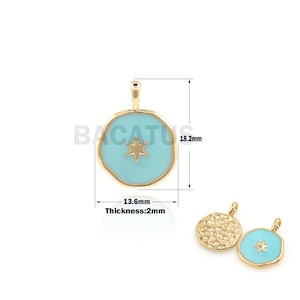 May include: Gold pendant charm with a light blue enamel star design. The pendant is 1.8 cm tall and 1.3 cm wide. The pendant is 0.2 cm thick.