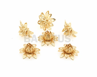 Puede incluir: Seis adornos de metal de color dorado en forma de flor con diseños intrincados. Los adornos son perfectos para agregar un toque de elegancia a las joyas, las manualidades y otros proyectos.