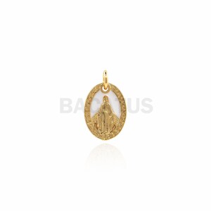 May include: Gold oval pendant with a white enamel image of the Virgin Mary. The pendant has a detailed border.
