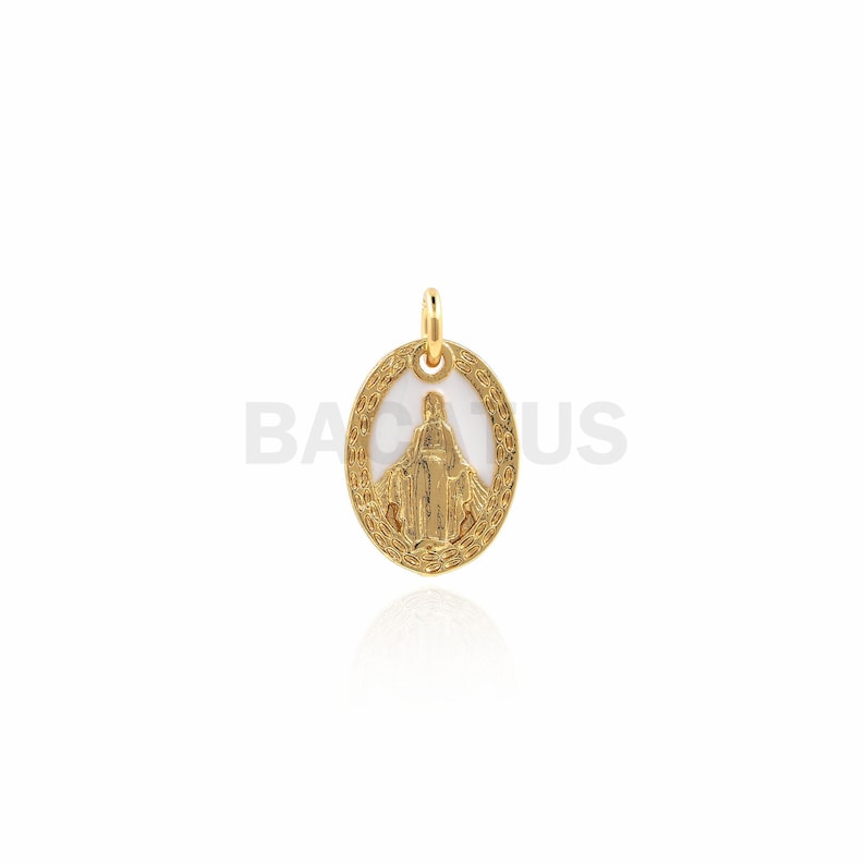 May include: Gold oval pendant with a white enamel image of the Virgin Mary. The pendant has a detailed border.