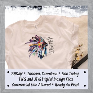 May include: A white t-shirt with a colorful graphic of a Native American headdress with feathers and flowers. The graphic is surrounded by a circle with the text "Dream without Fear, Live without Limits".