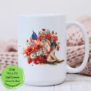 May include: A white ceramic mug with a design of cowboy boots, red roses, and an American flag. The design is painted in a watercolor style.