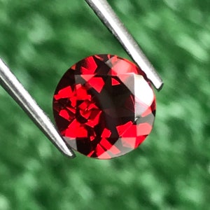 Natural Red Mozambique Garnet: 1.85 Carat Round Cut Gemstone