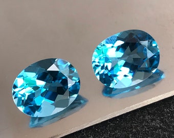 Orecchini ovali con topazio blu svizzero naturale (10 mm) – Coppia di pietre portafortuna di dicembre