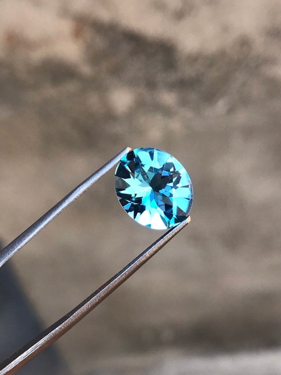Swiss Blue Topaz Gemstone: 4.90 Carat, 12mm Oval Cut, December Birthstone