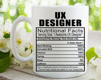 May include: White ceramic mug with a black graphic of a nutrition facts label for a UX Designer. The label lists the percentage daily value of hard working, unrivaled skill, passion, caring, sleep, and caffeine.