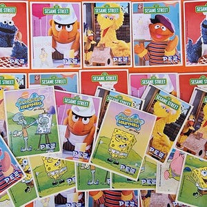 PEZ Vintage Memorabilia Stickers Sesame Street and Spongebob PEZ Collection Souvenirs PEZ adverts Pez Collector Dispensers