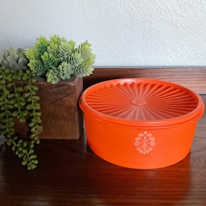 Vintage TUPPERWARE orange round canister Servalier snap on lid