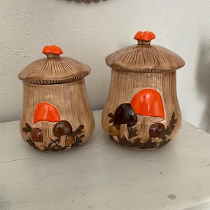 Vintage two piece set large 11 inch Arnel’s mushroom ceramic canister and 9 inch ceramic canister