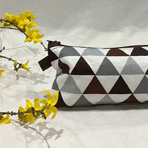 Handmade bags that can be used for anything you wish to keep together,so that you dont loose them, and can be easily sourced and organised. geometric