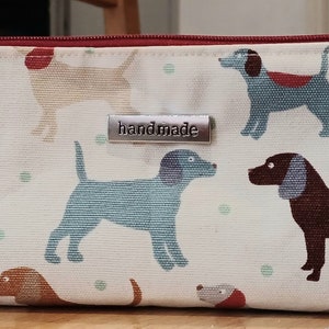 Handmade bags that can be used for anything you wish to keep together,so that you dont loose them, and can be easily sourced and organised. Dogs