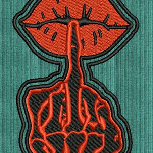 May include: A black and red embroidered patch of a middle finger with a finger over its mouth, symbolizing the phrase "shhh". The finger is in the shape of a hand with a red outline. The mouth is red with a black outline.