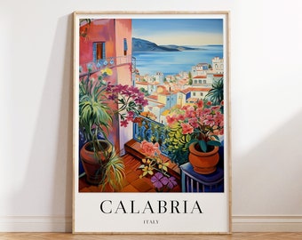 Puede incluir: Una pintura colorida de una ciudad con un balcón con vistas al mar. La pintura está enmarcada en madera y tiene el texto "CALABRIA ITALIA" en la parte inferior.