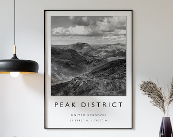 May include: Black and white photograph of a mountainous landscape with the text "Peak District, United Kingdom, 53.3342° N, 1.7837° W" printed below the image.