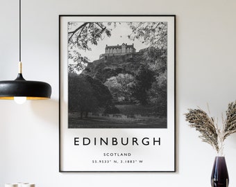 May include: Black and white photograph of Edinburgh Castle in Scotland. The image is printed on a poster with the text "EDINBURGH, SCOTLAND, 55.9533° N, 3.1883° W" printed below the image.