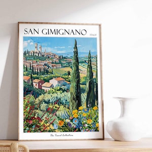May include: A vintage travel poster featuring a colorful illustration of San Gimignano, Italy. The poster depicts a picturesque view of the town with its iconic medieval towers, surrounded by lush green hills and vibrant wildflowers. The text "SAN GIMIGNANO ITALY" is displayed at the top of the poster, and "The Travel Collection" is at the bottom.