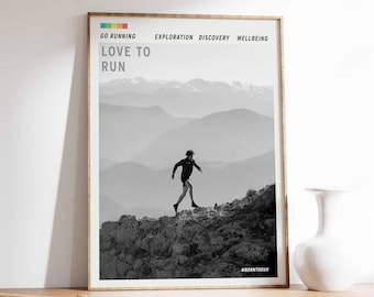 May include: Black and white photo of a person running on a mountain trail. The photo is framed and has the text "LOVE TO RUN" and "#BORNTORUN" on it.