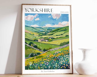 May include: A vintage-style travel poster featuring a scenic landscape of rolling green hills and a small village in Yorkshire, England. The poster has a blue sky with white clouds and a field of wildflowers in the foreground. The text "Yorkshire, England" is at the top of the poster, and "The Travel Collection" is at the bottom.