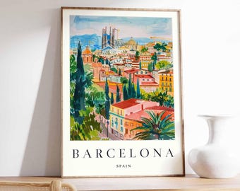 May include: A colorful watercolor illustration of the Barcelona skyline, featuring the Sagrada Familia cathedral and surrounding buildings. The text "BARCELONA SPAIN" is printed below the image.