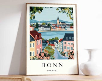 May include: A colorful illustration of the city of Bonn, Germany. The image shows a view of the city from a hilltop, with the Rhine River in the foreground and the city skyline in the background. The image is framed in a wooden frame and includes the text "BONN GERMANY".