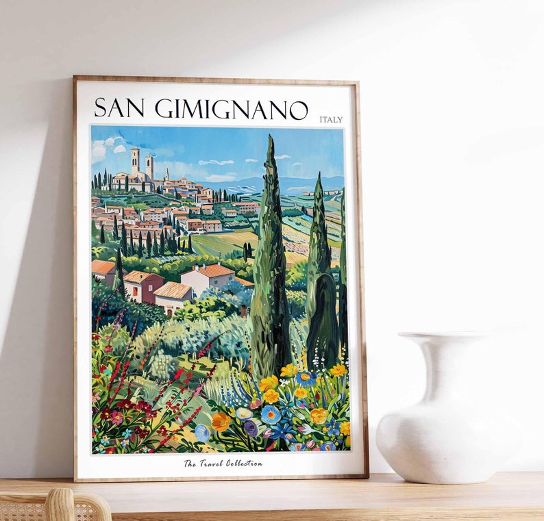 May include: A vintage travel poster featuring a colorful illustration of San Gimignano, Italy. The poster depicts a picturesque view of the town with its iconic medieval towers, surrounded by lush green hills and vibrant wildflowers. The text "SAN GIMIGNANO ITALY" is displayed at the top of the poster, and "The Travel Collection" is at the bottom.