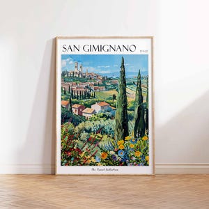 May include: A vintage travel poster featuring a colorful illustration of San Gimignano, Italy. The poster has a light blue sky with white clouds, a green hillside with trees and houses, and a view of the town's iconic towers in the distance. The text "SAN GIMIGNANO" and "ITALY" is printed in black at the top of the poster. The text "The Travel Collection" is printed in black at the bottom of the poster.