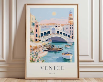 May include: Framed art print of Venice, Italy, featuring the Rialto Bridge over a canal. The artwork has a vintage travel poster style, with gondolas, buildings, and a sunny sky. The text "Venice Italy" is at the bottom.